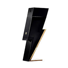 Carolina Herrera Bad Boy EDT perfume bottle, a bold men’s fragrance with pepper, bergamot, cocoa, and tonka bean.
